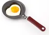 A heart-shaped frying pan with a fried egg inside, presented on a white background. Náhľad obrázku produktu
