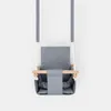 A baby swing seat is shown hanging against a white background. Produktbild-Vorschau