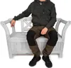 A person sitting on a wooden park bench. Náhled obrázku produktu