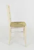 A side view of a wooden chair with a straw seat against a white background. Produktbild-Vorschau