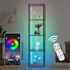 A tall, narrow display cabinet with glass shelves, illuminated by colorful LED lights, is shown in a room setting. A smartphone displaying a color wheel app and a remote control are also visible, suggesting smart control of the lighting. Produktbild-Vorschau