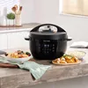 An Instant Pot multi-cooker is shown on a kitchen counter with food dishes around it. Anteprima dell’immagine prodotto