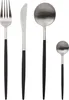 A set of four cutlery pieces arranged side-by-side on a white background. Voir les images du produit