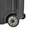 A close-up view of the bottom corner of a black suitcase, showing one of its wheels. Produktbild-Vorschau