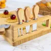 A cheese board with a set of cheese knives. Náhľad obrázku produktu