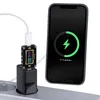 A smartphone is charging using a dual USB power adapter and a charging meter. Produktbild-Vorschau
