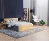 A bedroom scene with a bed, nightstand, bookshelf, armchair, and floor lamp. Produktbild-Vorschau