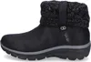 Side view of a black Skechers boot with a knitted cuff. Voir les images du produit