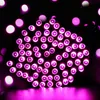 A cluster of pink LED lights against a black background. Produktbild-Vorschau