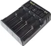 A black universal battery charger with four slots, shown from a slightly elevated angle on a white background. Produktbild-Vorschau