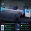 A bedroom scene with a bed and two nightstands, one on each side of the bed. The nightstands have LED lights that are illuminated in blue. Produktbild-Vorschau