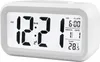 A digital alarm clock displaying the time, date, and temperature. Náhled obrázku produktu