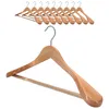 A group of wooden hangers are shown stacked, with one large, prominent wooden hanger in the foreground. Produktbild-Vorschau