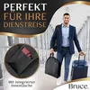 A man is walking in an airport with luggage. Produktbild-Vorschau