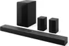 A black LG soundbar system, including a soundbar, subwoofer, and two satellite speakers, is displayed against a white background. Voir les images du produit