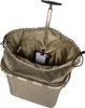 The interior of a shopping trolley bag is shown, with a drawstring closure and a small mesh pocket inside. Voir les images du produit