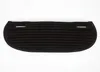 A black trapezoidal saddle pad with ribbed texture and two small slots on the top edge, shown flat against a white background. Anteprima dell’immagine prodotto