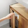 Hand öffnet Tür des SoBuy Schranks BZR63-L-PF, zeigt Stauraum für Toilettenpapier Produktbild-Vorschau