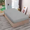 A bed with a fitted sheet in a bedroom setting. Produktbild-Vorschau