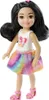 A doll standing against a white background. Podgląd zdjęcia produktu