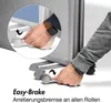 A close-up of a hand demonstrating how to engage the brake on a caster wheel of a modular partition system. Produktbild-Vorschau