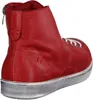 A single red high-top sneaker boot is shown from the side and slightly from the back. Voir les images du produit