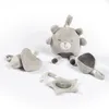 A collection of baby toys arranged on a white background. Produktbild-Vorschau