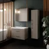 A modern bathroom with a vanity, mirror, and cabinet. Produktbild-Vorschau