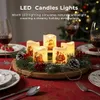 A festive Christmas table setting with LED candles, wine glasses, and plates. Produktbild-Vorschau