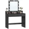 A black vanity table with a lighted mirror and makeup accessories. Náhľad obrázku produktu