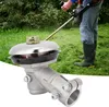 A person is using a string trimmer in a grassy area. Produktbild-Vorschau