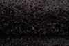 A close-up view of a shaggy rug. Produktbild-Vorschau