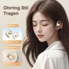 A woman with her eyes closed is wearing gold and white earbuds. The image also shows close-ups of the earbuds and text describing their features. Produktbild-Vorschau