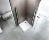 A modern shower cabin with glass doors and a white shower tray, set in a bathroom with tiled walls and a patterned floor. Produktbild-Vorschau