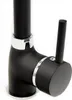 A close-up of a black kitchen faucet with silver accents. Náhľad obrázku produktu