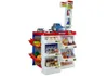 A toy supermarket playset with shelves stocked with toy groceries and a toy cash register. Produktbild-Vorschau