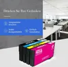 A marketing image showing printer ink cartridges in the foreground and an office environment in the background. Produktbild-Vorschau
