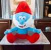 A plush toy of Papa Smurf sitting on a marble surface. Produktbild-Vorschau