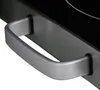 A close-up of a handle on a black appliance. Anteprima dell’immagine prodotto