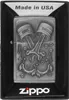A Zippo lighter with an engine parts design, presented in its packaging. Podgląd zdjęcia produktu