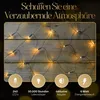 A net of warm white LED lights is draped over a wooden background, with informational icons and text at the bottom. Produktbild-Vorschau