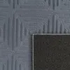A close-up view of a gray rug, showing its textured pattern and the underside of the rug. Anteprima dell’immagine prodotto