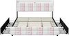 A white and pink upholstered bed frame with storage drawers. Produktbild-Vorschau