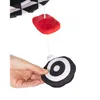 A hand is holding a black and white target-shaped toy that is part of a baby mobile. Produktbild-Vorschau