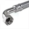 A close-up shot of a stainless steel braided hose with an elbow fitting and a nut. Produktbild-Vorschau