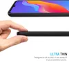 A hand is holding a thin black phone case to demonstrate its slim profile. Náhľad obrázku produktu