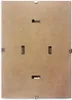 The back of a frameless picture holder with clips. Produktbild-Vorschau