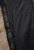 Close-up view of the inside lining and pocket of a jacket. Produktbild-Vorschau