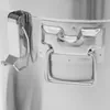 A close-up of the latch and handle of a stainless steel storage container. Podgląd zdjęcia produktu