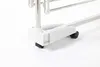 A close-up view of the base and wheels of a white drying rack. Produktbild-Vorschau